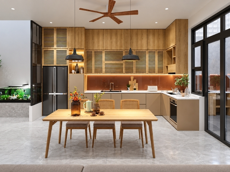 Khu bếp nhà phố 5x20 phong cách Japandi với tủ gỗ cánh lá sách và bàn ăn ghế mây