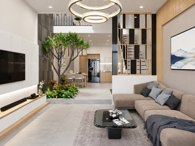 Mẫu phòng khách nhà phố 2 tầng có giếng trời và cây xanh