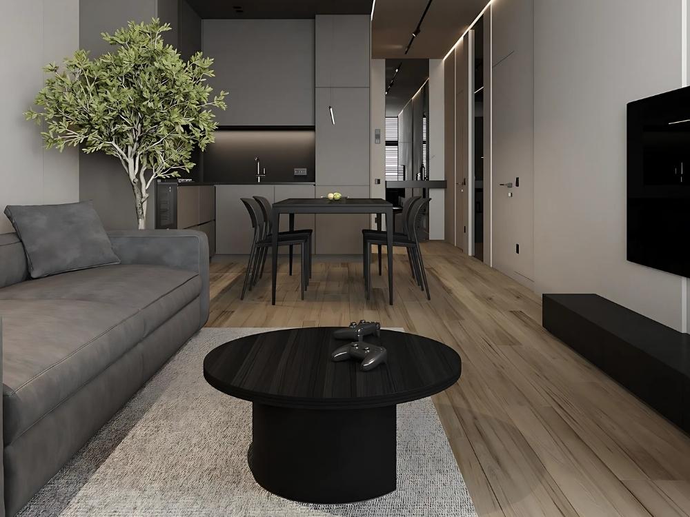 Phòng khách chung cư 43m2 với sofa xám, bàn trà kính