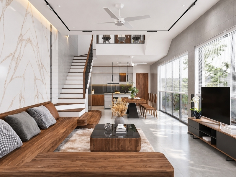 Nội thất phòng khách nhà phố 5x20 phong cách tối giản với sofa phản gỗ bệt và vách kính lớn