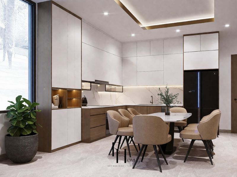 Phòng bếp chung cư 100m2 phong cách tối giản tủ chữ L cánh trắng phối gỗ walnut và bàn ăn tròn 6 ghế vải camel