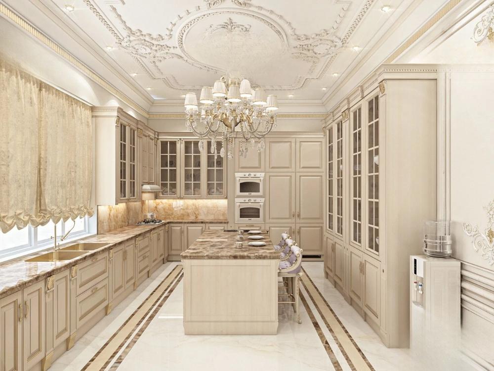 Phòng bếp Tân Cổ Điển sử dụng đá hoa cương và kim loại mạ vàng, không gian tiện nghi và sang trọng.