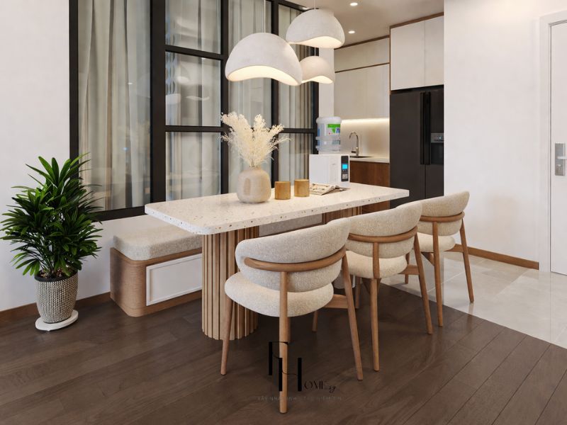 Phòng bếp chung cư 55m2 phong cách Wabi Sabi với bàn ăn mặt terrazzo chân gỗ nan dọc, ghế vải boucle và đèn thả bán cầu giấy