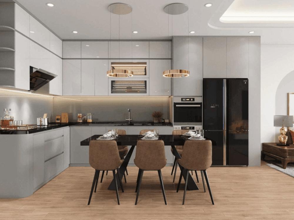 Phòng bếp chung cư 75m² được bố trí theo dạng chữ L kết hợp bàn ăn lớn