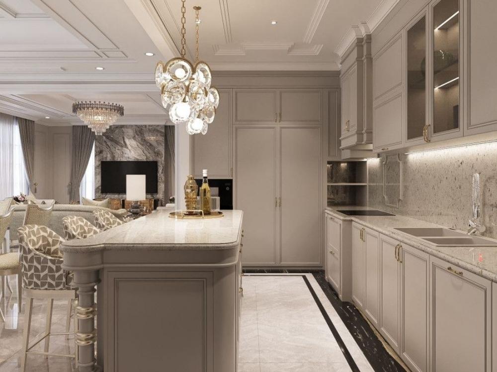 Phòng bếp nhà phố phong cách Tân cổ điển, thiết kế với tủ bếp trắng viền vàng, mặt đá marble, bàn ăn dài và ghế bọc da cao cấp