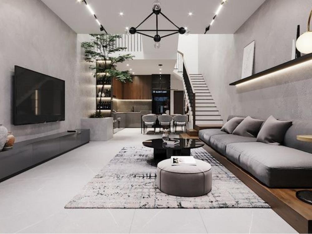 Phòng khách Tối giản với màu trắng, xám và đen, sofa đơn giản, bàn trà kính và thép không gỉ, mang lại không gian thoáng đãng và ngăn nắp