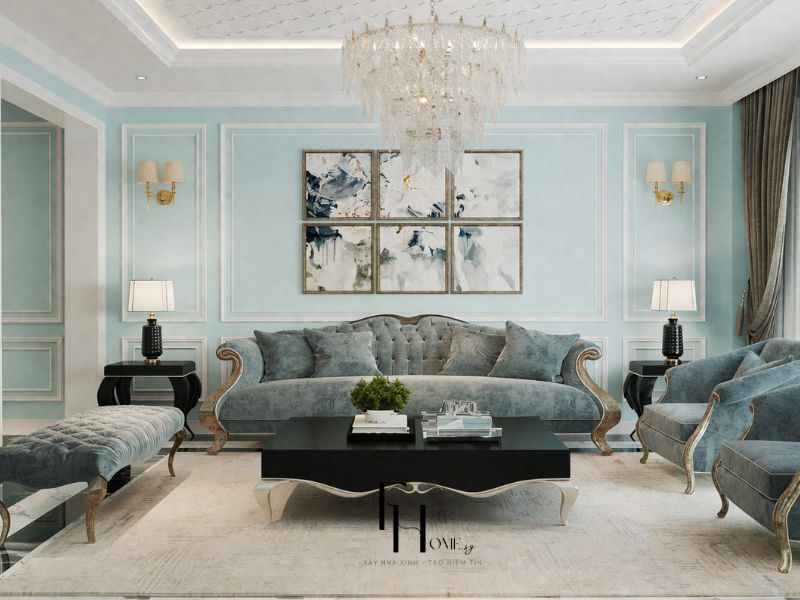 Phòng khách 70m2 phong cách Tân cổ điển tông xanh bạc hà, sofa chesterfield, đèn chùm pha lê