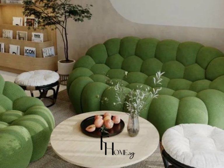 Phòng khách dự án thiết kế nội thất chung cư 82m2 Wabi Sabi mix Japandi tại Vinhomes Grand Park sofa bubble xanh lá và kệ gỗ