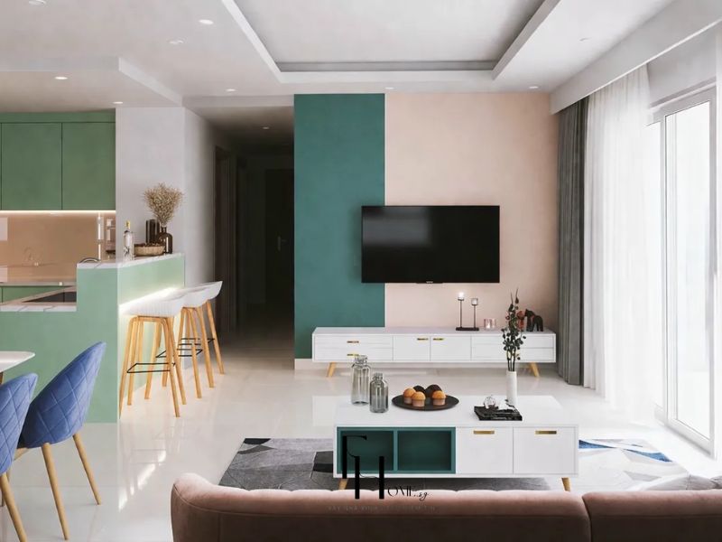 Phòng khách chung cư 45m2 bố trí phong thủy hợp lý quầy bar liền bếp tủ xanh lá sofa hồng đất kệ ti vi trắng tường xanh mòng két hồng phấn sàn gạch trắng