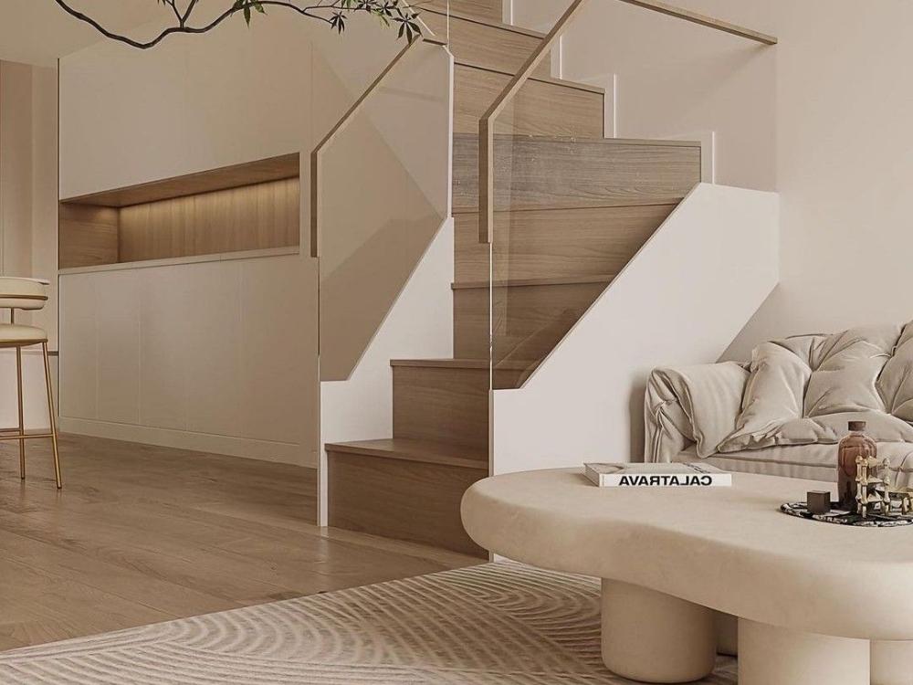 Phòng khách nhà ống 1 tầng với nội thất tối giản, tông màu sáng và ánh sáng tự nhiên từ cửa kính lớn