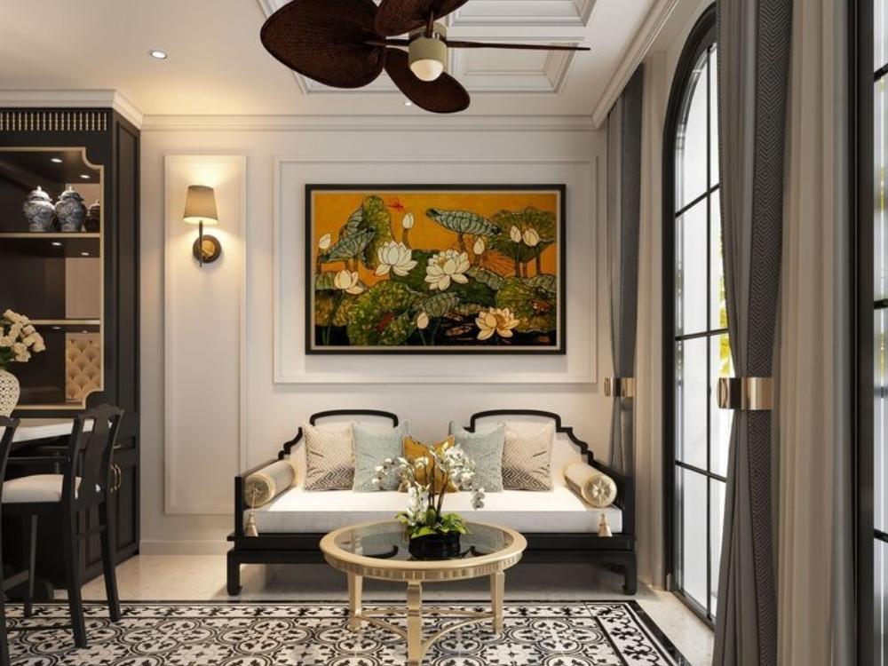 Phòng khách phong cách Indochine với sofa và bàn gỗ teak, kết hợp mây tre đan, mang vẻ hoài cổ và sang trọng