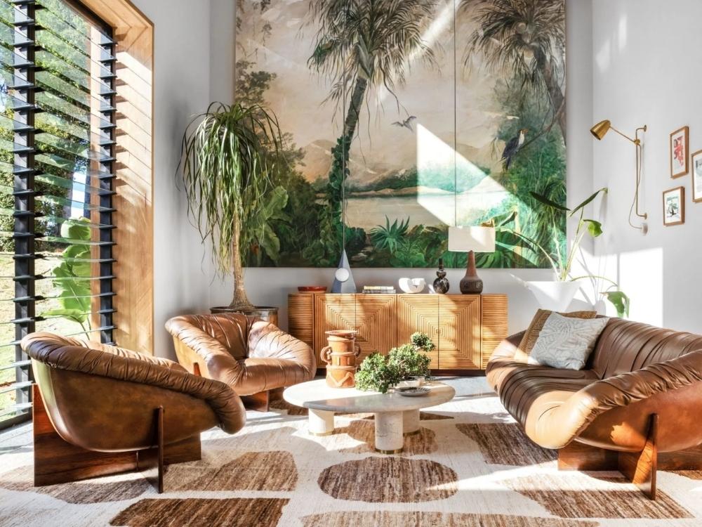 Phòng khách phong cách Tropical với vật liệu mây tre và màu sắc tươi sáng, tạo không gian thoáng mát, thư giãn như resort nhiệt đới