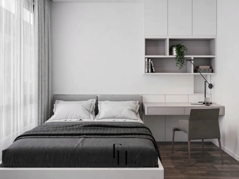 Phòng ngủ chung cư 60m2 một phòng ngủ với giường xám và góc làm việc tích hợp
