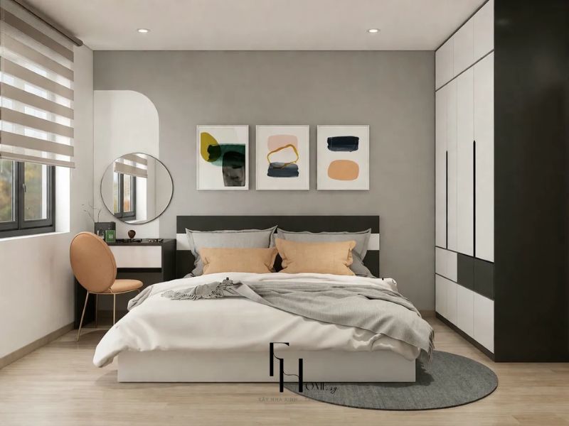 Phòng ngủ chung cư 55m2 với 1 phòng ngủ, giường đôi đầu giường đen, tủ quần áo hai tông trắng đen và bàn trang điểm gắn tường