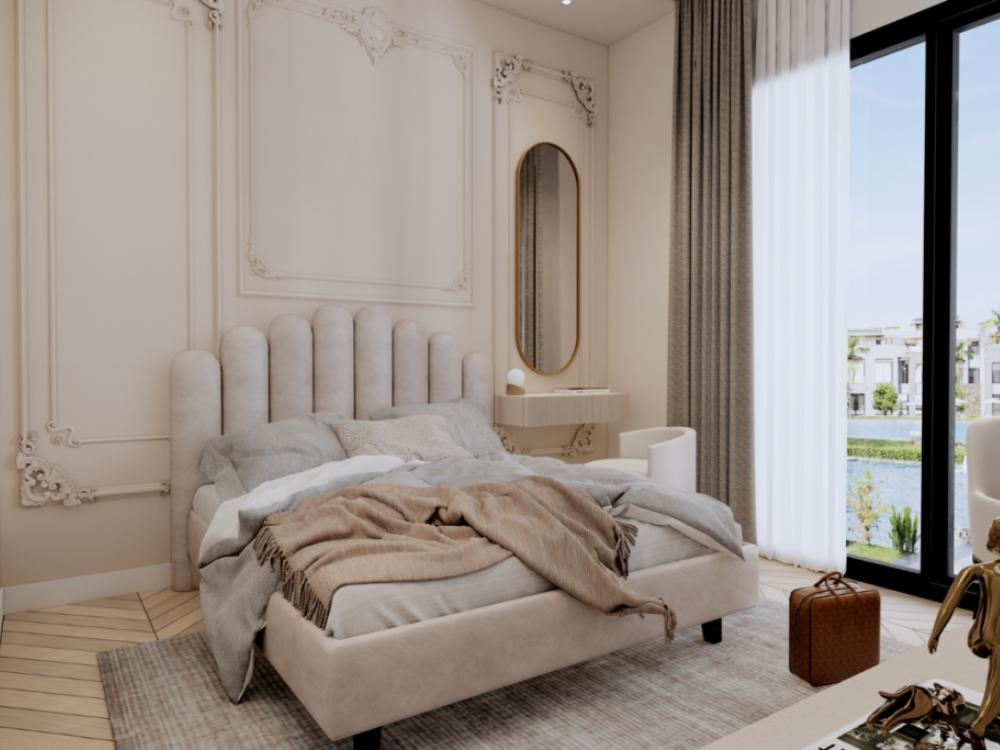 Phòng ngủ khác tận dụng góc phòng để bố trí bàn trang điểm nhỏ, tăng diện tích sử dụng mà không làm chật không gian