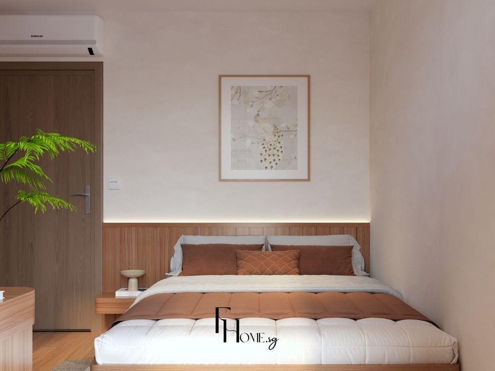 Phòng ngủ khách trang trí nhẹ nhàng với tranh tường, cây xanh và đèn vàng ấm