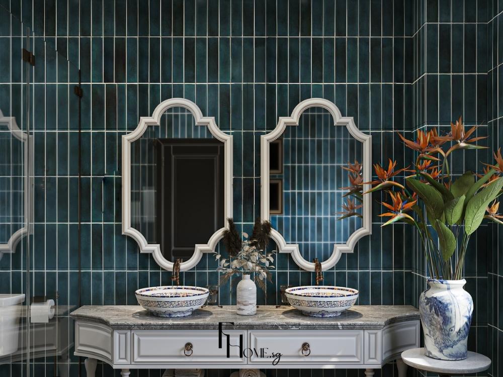 Phòng vệ sinh với gạch ốp tường sáng màu và gương lớn trong phòng vệ sinh giúp không gian thêm sáng sủa, tạo cảm giác thoáng mát và rộng rãi