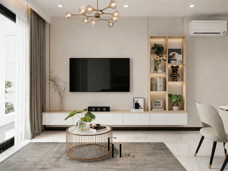 Phòng khách chung cư 68m2 phong cách Hiện Đại với kệ TV nổi trắng gỗ sồi kệ mở đèn LED, đèn chùm nhánh đồng thau và bàn trà mặt đá khung dây vàng