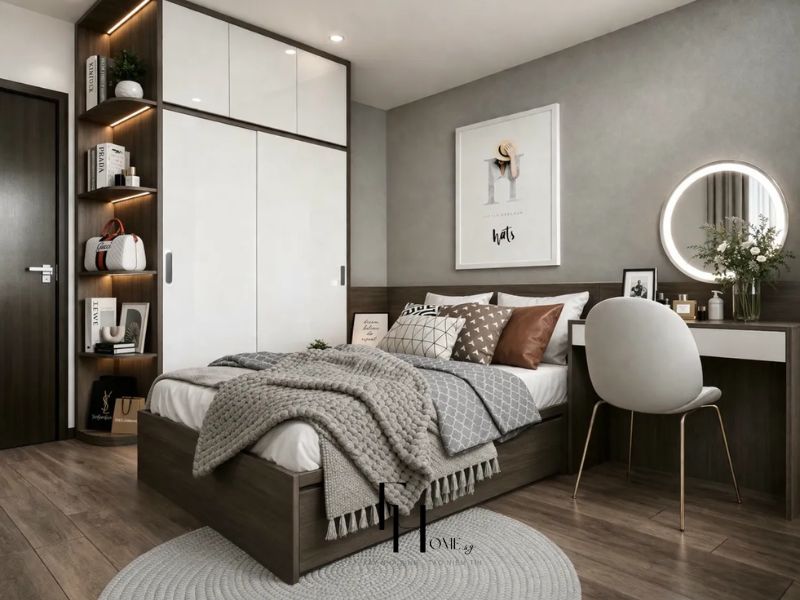 Phòng ngủ chung cư 68m2 tường xám vi xi, tủ trắng bóng kết hợp kệ mở gỗ nâu đèn LED và bàn trang điểm gương tròn đèn LED viền