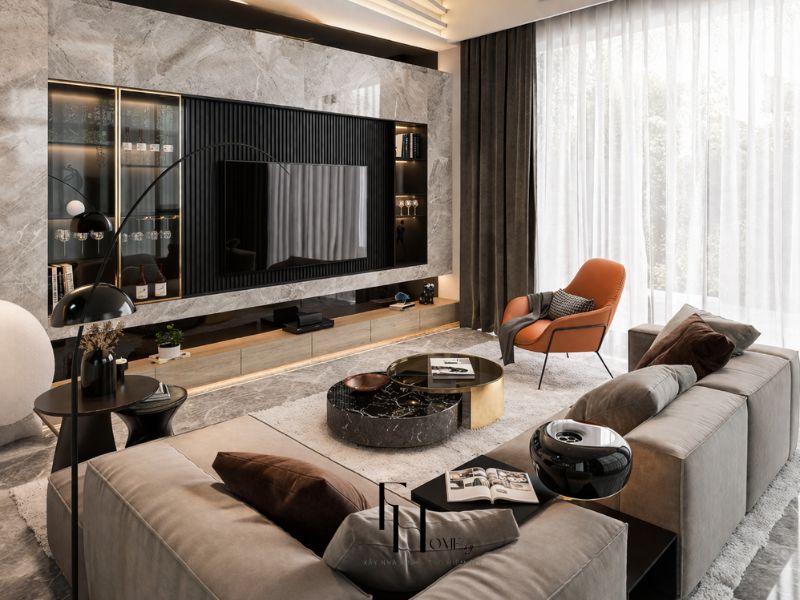 Phòng khách chung cư 77m2 tường sơn xanh rêu đậm sofa nỉ xanh rêu tủ âm tường trắng kệ mở cây xanh góc phòng