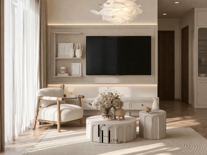 Thiết kế nội thất chung cư 80m2 Wabi Sabi phòng khách sofa be bàn cà phê hình trụ đèn chùm hoa giấy