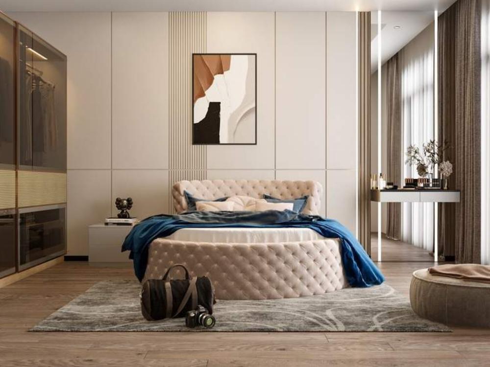 Thiết kế nội thất phòng ngủ 30m² phân chia thành các khu vực chức năng riêng biệt bao gồm khu nghỉ ngơi với giường tròn, khu thay đồ và khu làm việc