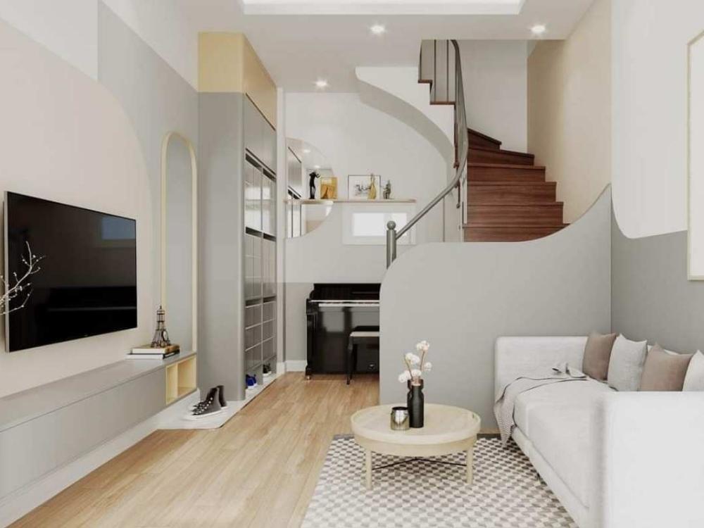 Thiết kế phòng khách nhà phố 5x16 có gara tầng trệt, bố trí liền kề khu vực hành lang, sử dụng tông sáng và nội thất hiện đại