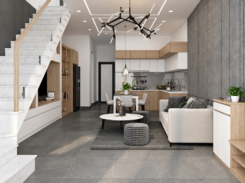 Thiết kế tầng trệt nhà phố 50m2 không gian mở với kệ tivi dưới gầm cầu thang
