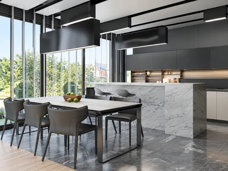 Thiết kế bếp ăn phong cách Hi-tech có đảo đá xám cùng tủ tối màu bên cửa kính cao sát trần.