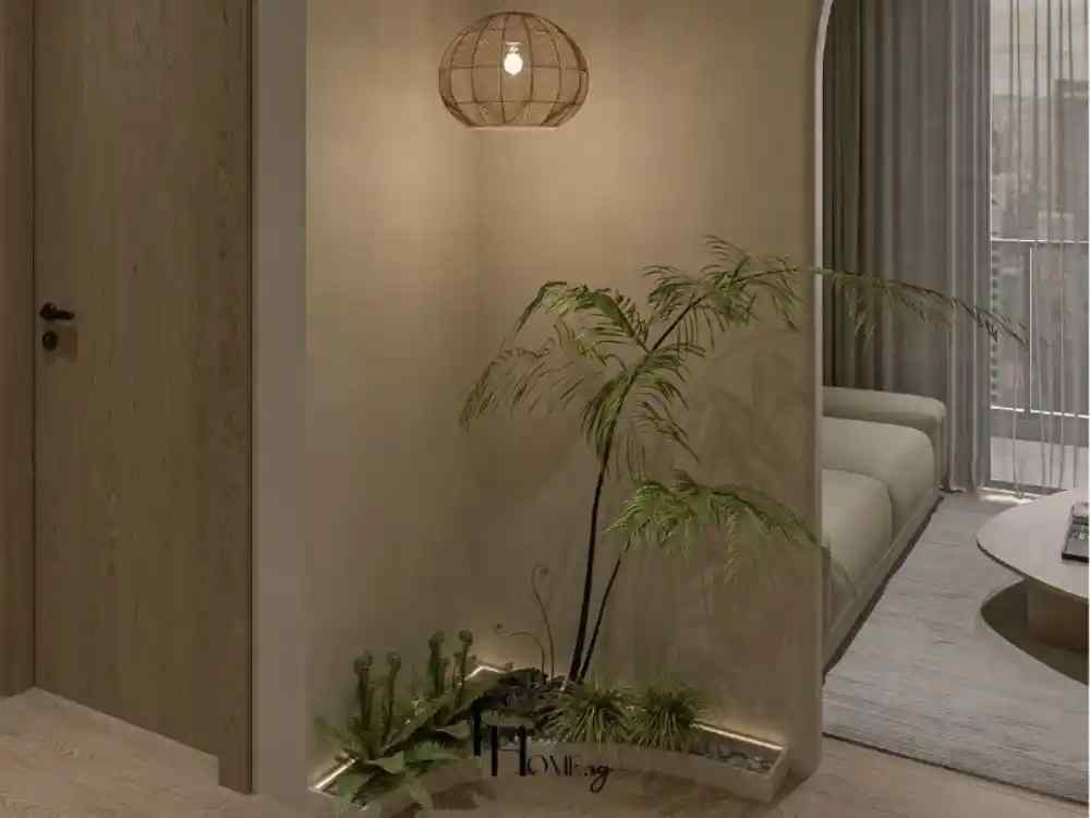 Góc tiểu cảnh trong căn hộ với mảng tường bo cong, cây xanh trang trí và đèn tre treo trần