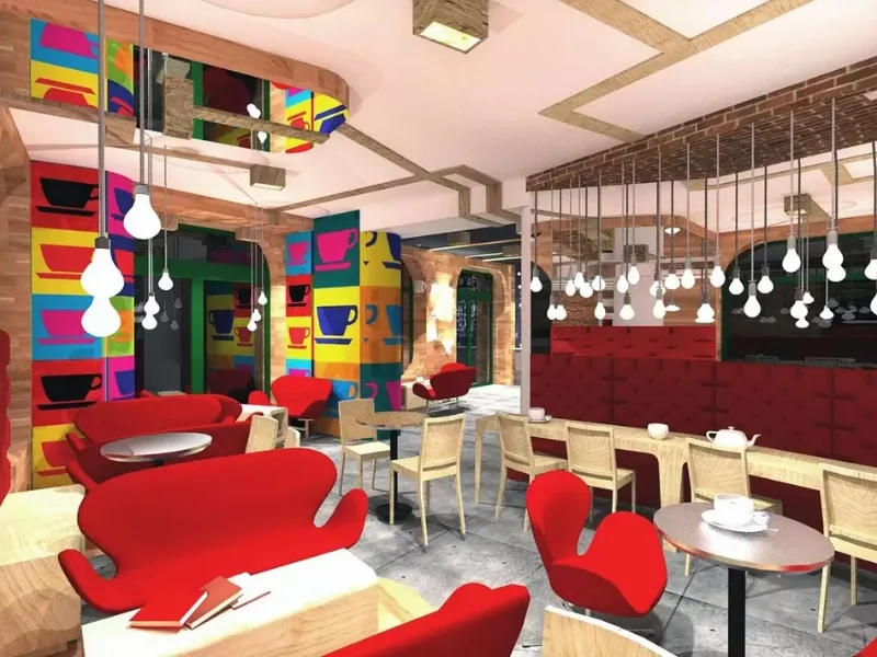 Không gian ăn uống phong cách Funky bố trí ghế đỏ uốn lượn trước các mảng tường nhiều màu và đèn thả.