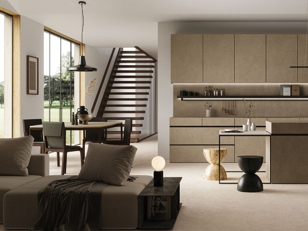 Không gian bếp mở cùng phòng khách, tủ bếp phẳng màu be, đường nét vuông vức, nội thất gỗ