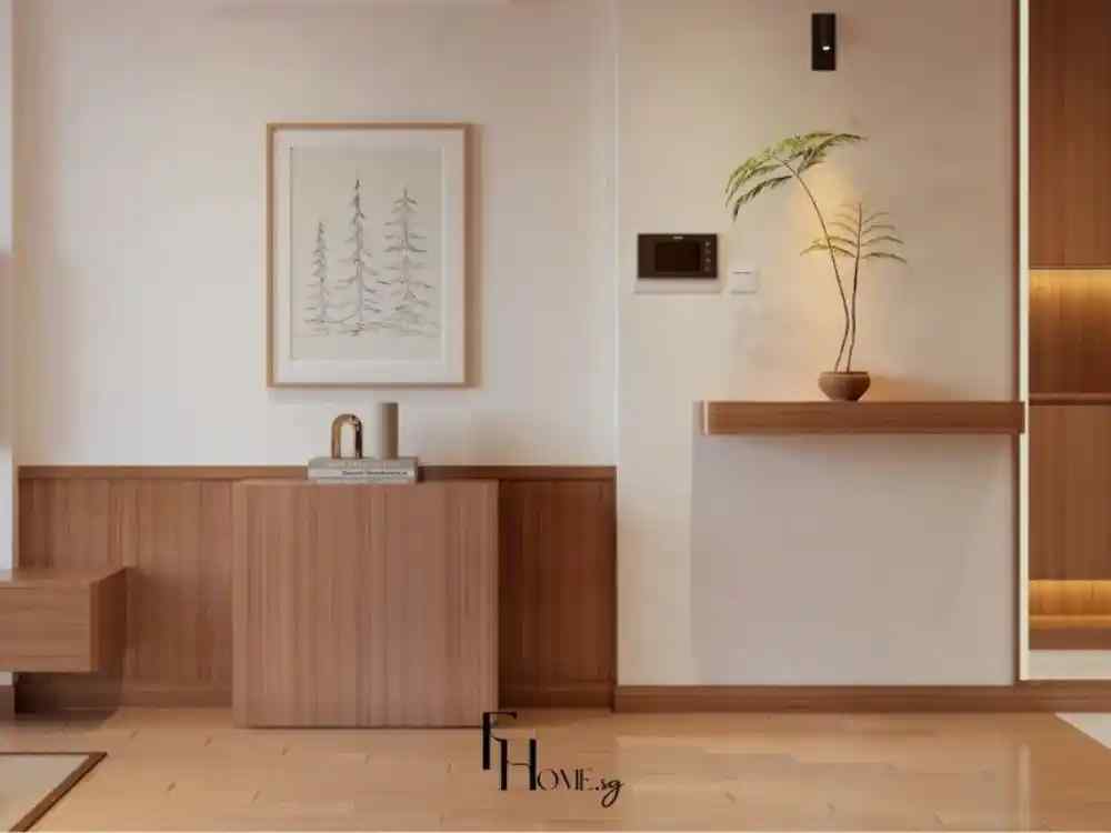 Không gian hành lang phong cách Japandi với tường sáng, tủ gỗ thấp trang trí sách và bình gốm