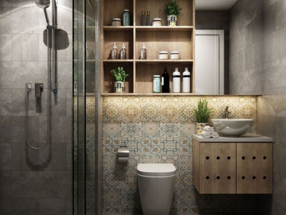 Nhà vệ sinh Indochine nhỏ gọn, gạch hoa cổ điển kết hợp gỗ sáng màu và chậu rửa tròn đặt nổi hiện đạiv