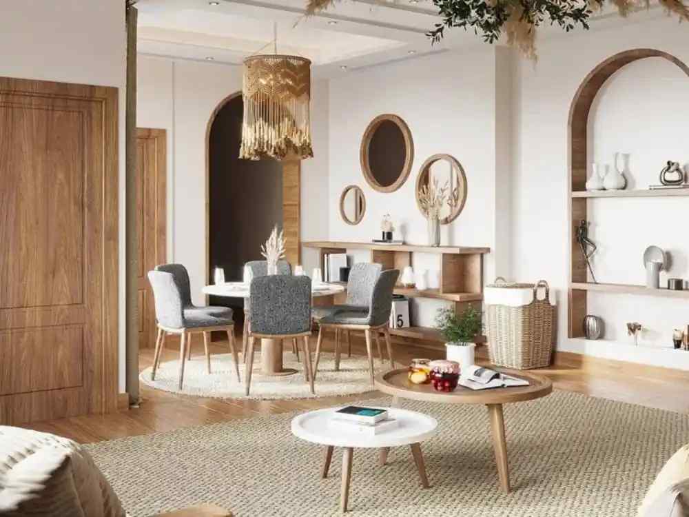 Phòng ăn Scandinavian ấm cúng với bàn tròn gỗ sáng, ghế bọc vải xám, đèn treo tua rua thủ công