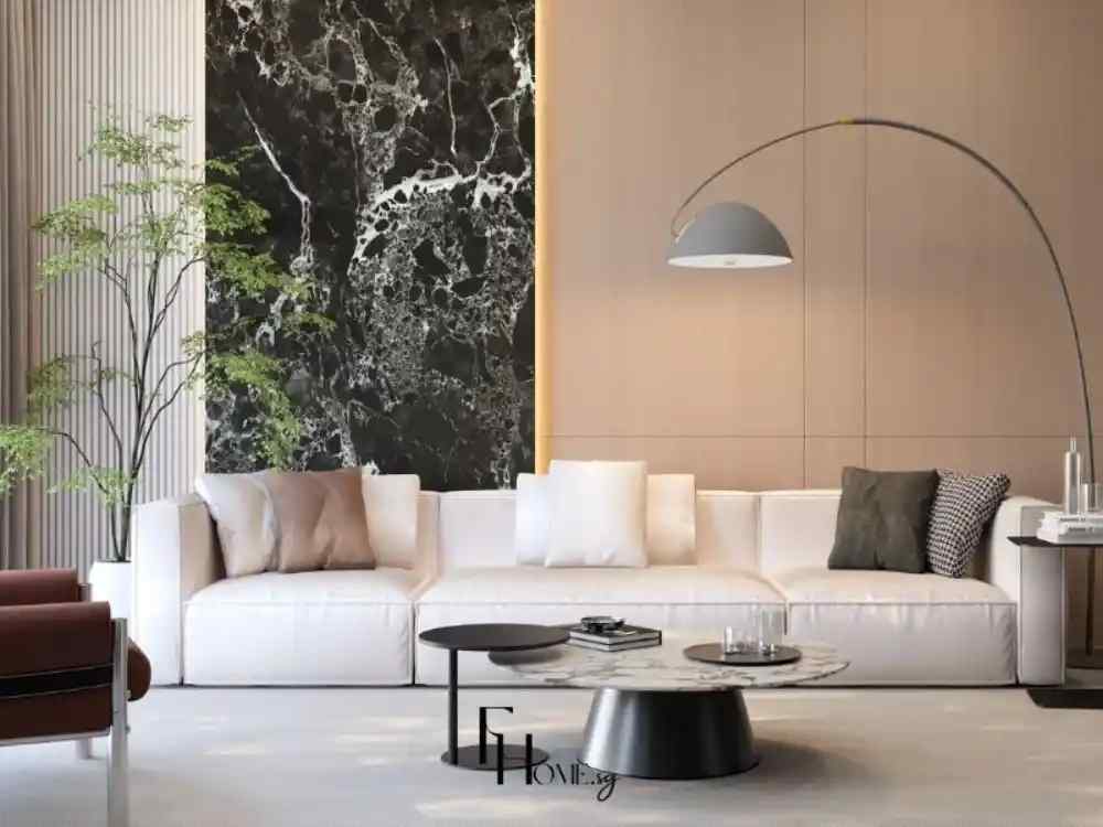 Phòng khách hiện đại sang trọng, sofa trắng trước mảng tường đá đen vân mây ấn tượng.