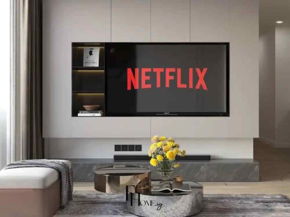 Phòng khách hiện đại với tivi treo tường, bàn cà phê mặt đá, tông màu xám be chủ đạo