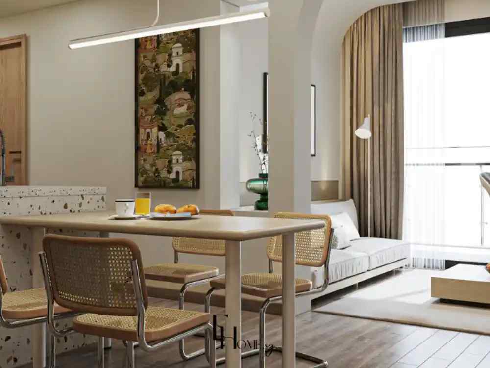Phòng khách liền bếp phong cách tối giản với bàn ăn mặt sáng, ghế mây khung thép, tranh tường nghệ thuật