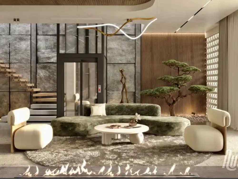 Phòng khách nhà phố hiện đại với sofa nhung xanh rêu uốn cong, tường đá xám và cây bonsai trang trí