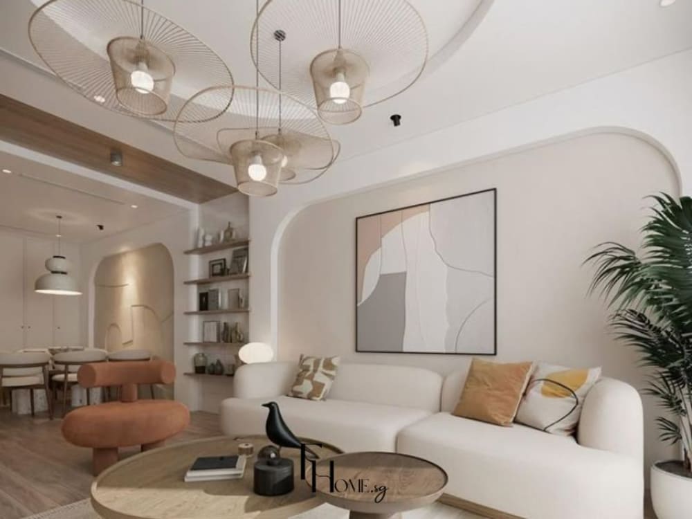 Phòng khách phong cách Địa Trung Hải với tông màu trắng kem chủ đạo, sofa vải bo tròn mềm mại, điểm nhấn decor tự nhiên