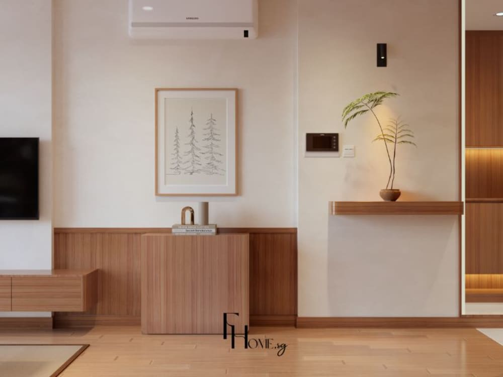Phòng khách phong cách Nhật Bản với tông màu gỗ sáng, tường trắng tối giản, tranh treo tường và chậu cây nhỏ