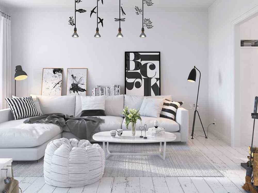 Phòng khách phong cách Scandinavian với sofa trắng, sàn gỗ sáng màu