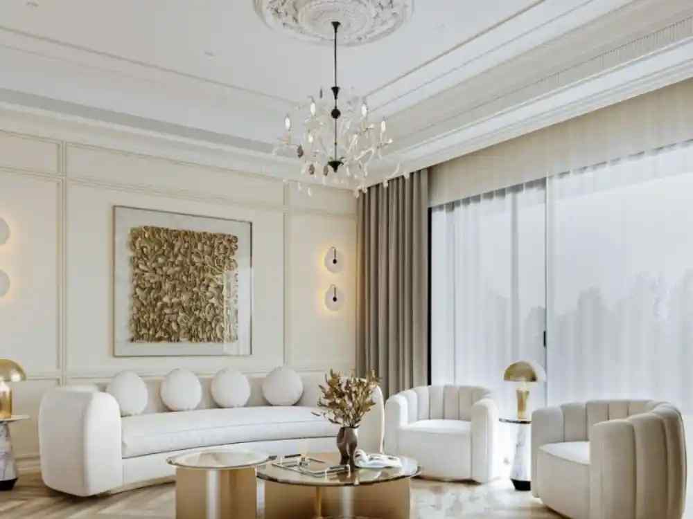 Phòng khách theo phong cách tân cổ điển tông trắng kem, sofa tròn mềm và đèn chùm pha lê sang trọng