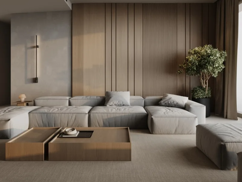 Phòng khách phong cách Tối giản bố trí sofa module xám quanh bàn trà khối vuông.
