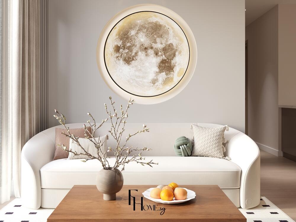 Phòng khách tối giản với sofa cong trắng, bàn gỗ và tranh trăng tròn nổi bật trên tường