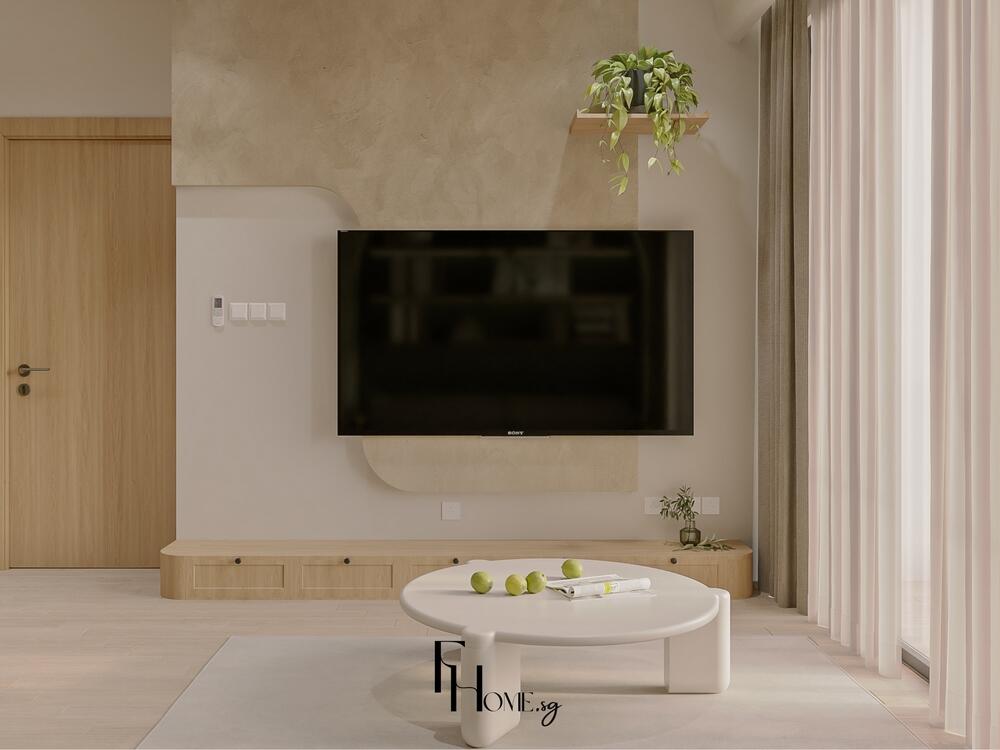 Phòng khách tối giản với TV treo tường, bàn trà thấp và cây trang trí nhỏ gọn