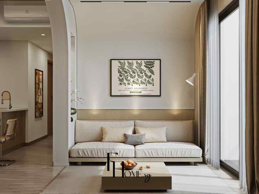 Phòng khách tông be sáng với sofa vải bố, bàn trà thấp gỗ sáng và tranh lá đen trắng