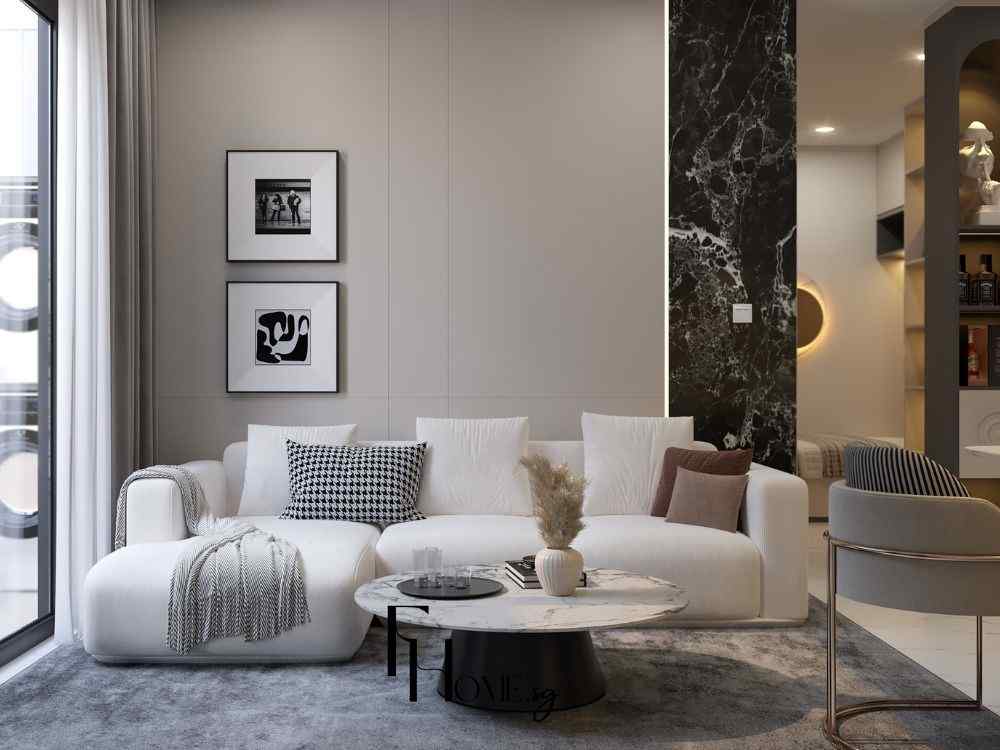 Phòng khách tông sáng với sofa trắng, bàn tròn mặt đá, tường điểm nhấn đen