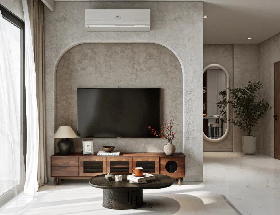 Phòng khách phong cách Wabi Sabi với tường trát thô vòm tivi, kệ gỗ óc chó và bàn trà đá mặt sần