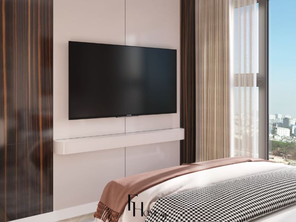 Phòng ngủ căn hộ 50m2 với tivi treo tường đối diện giường, cửa sổ lớn giúp đón ánh sáng tự nhiên